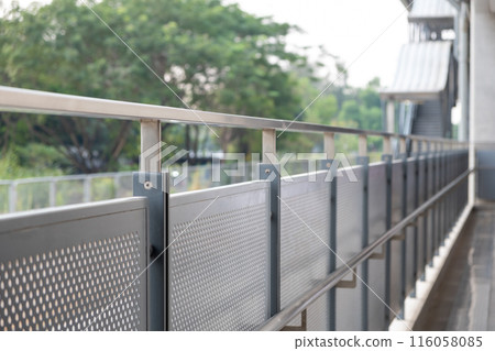 Fence at the train station. The SRT Dark Red Line is a rapid transit line operated as part of the MBTA subway system from Bangkok to Rangsit. 116058085