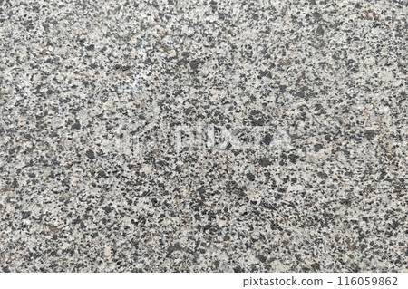 Concrete texture. Pebbles of different colors and signs of aging are visible. 116059862