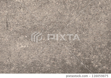 Concrete texture. Pebbles of different colors and signs of aging are visible. 116059875