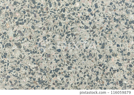 Concrete texture. Pebbles of different colors and signs of aging are visible. 116059879