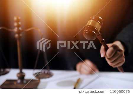 Law theme, gavel or mallet of the judge, lawyer enforcement officers, evidence-based cases taken into account in the court abount business, legislation. Law theme, gavel or mallet of the judge, lawyer enforcement officers, evidence-based cases taken into account in the court abount business, legislation. 116060076