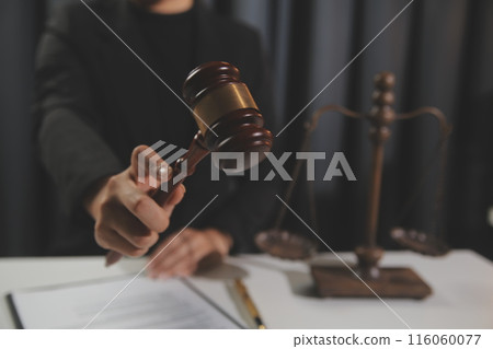 Law theme, gavel or mallet of the judge, lawyer enforcement officers, evidence-based cases taken into account in the court abount business, legislation. Law theme, gavel or mallet of the judge, lawyer enforcement officers, evidence-based cases taken into account in the court abount business, legislation. 116060077