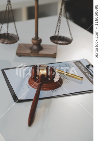 Law theme, gavel or mallet of the judge, lawyer enforcement officers, evidence-based cases taken into account in the court abount business, legislation. Law theme, gavel or mallet of the judge, lawyer enforcement officers, evidence-based cases taken into account in the court abount business, legislation. 116060099