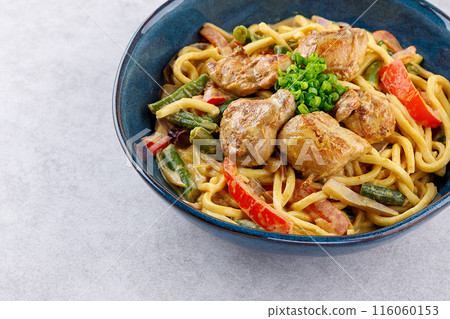 Curry Laksa. Coconut noodle with chicken meat and prawns. Peranakan noodle soup of noodles and seafood in rich curry soup. Asian traditional food. 116060153