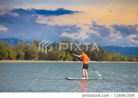 Man on stand up paddle. Water and beach sport 116061089