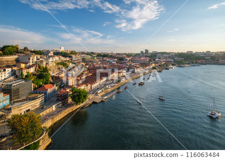 View of Vila Nova de Gaia city, Porto, Portugal on sunset View of Vila Nova de Gaia city, Porto, Portugal on sunset 116063484