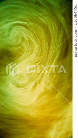 Smoke vortex. Ink cloud. Blur neon yellow green color glowing haze cloud texture paint floating in water dreamlike abstract art background. Smoke vortex. Ink cloud. Blur neon yellow green color glowing haze cloud texture paint floating in water dreamlike abstract art background. 116064456