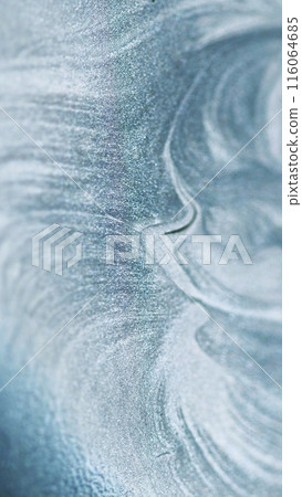 Glitter paint spill. Liquid silver texture. Defocused gray color metallic shimmering sand particles sparkling ink fluid flow abstract art background. Glitter paint spill. Liquid silver texture. Defocused gray color metallic shimmering sand particles sparkling ink fluid flow abstract art background. 116064685