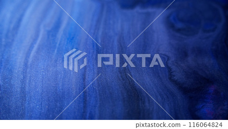 Wet glitter splash. Shiny texture. Defocused blue color gradient shimmering particles liquid gloss wave dark abstract art background. Wet glitter splash. Shiny texture. Defocused blue color gradient shimmering particles liquid gloss wave dark abstract art background. 116064824