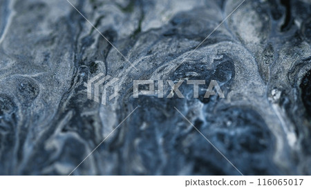 Glitter fluid texture. Shimmering ink. Blur gray silver color shiny metallic grain particles pigment paint mix flow abstract art background. 116065017