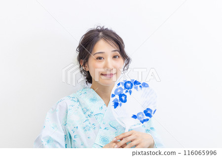 A young woman in a yukata white background 116065996