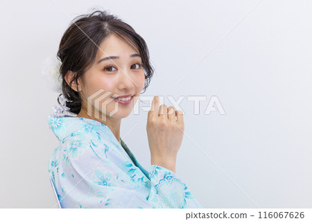 A young woman in a yukata white background A young woman in a yukata white background 116067626