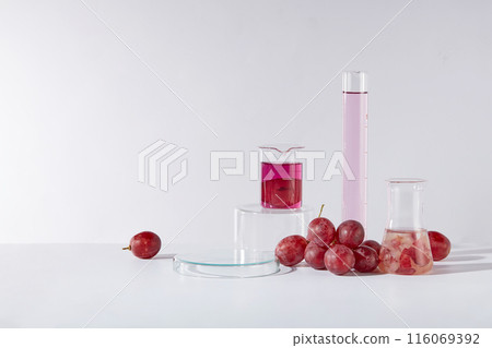 A group of experiment instruments placed on white laboratory background, empty showcase pedestal of glass for product showing. Photo of front view with copy space for text 116069392