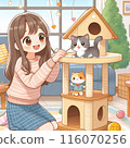 A cat playing on a cat tower and a girl watching over it 116070256