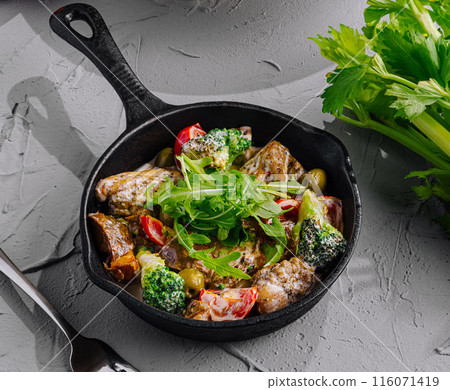 Gourmet rustic skillet meal top view Gourmet rustic skillet meal top view 116071419