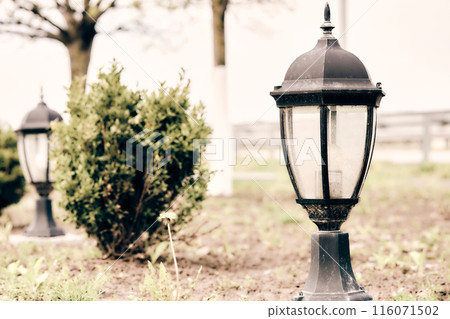 Street lighting. A simple lantern with an antique lamp Street lighting. A simple lantern with an antique lamp 116071502
