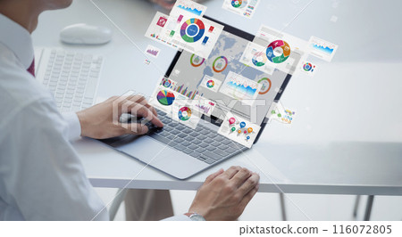 Business person using laptop with business data 116072805