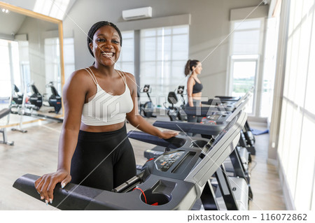 Healthy strong female African American plus-size sportswear Healthy strong female African American plus-size sportswear 116072862