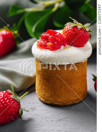 Fresh strawberry tarts on grey backdrop Fresh strawberry tarts on grey backdrop 116073347