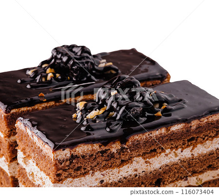 Decadent chocolate layer cake slices on white Decadent chocolate layer cake slices on white 116073404