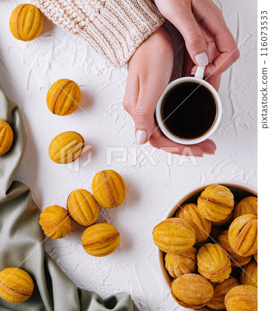 Cozy coffee break with freshly baked cookies Cozy coffee break with freshly baked cookies 116073533