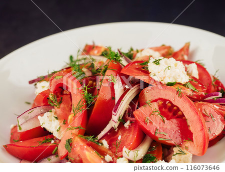 Salad with Goat Cheese, dill, Tomato and Red Onion Rings 116073646
