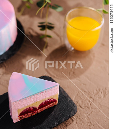 Holographic cake slice with orange juice Holographic cake slice with orange juice 116073653