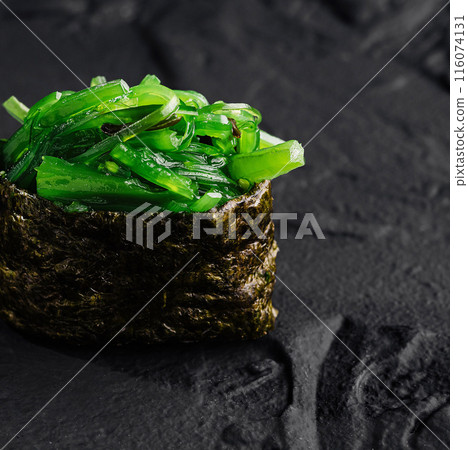Gourmet seaweed salad on dark slate Gourmet seaweed salad on dark slate 116074131