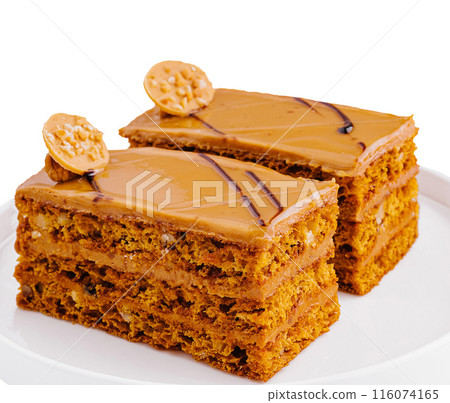 Gourmet peanut butter cake slices on white plate 116074165
