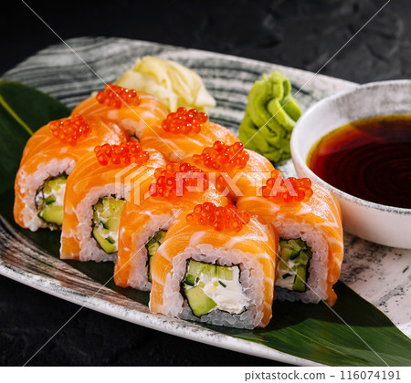 Exquisite sushi roll platter with salmon roe 116074191