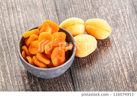 Dried apricot heap in the bowl Dried apricot heap in the bowl 116074953