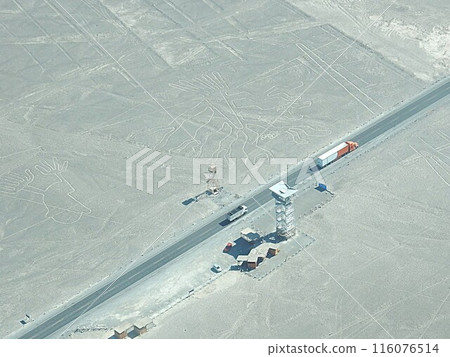 Watching geoglyphs from a mirador in the desert Watching geoglyphs from a mirador in the desert 116076514