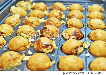 Takoyaki made on a takoyaki plate Takoyaki made on a takoyaki plate 116076855