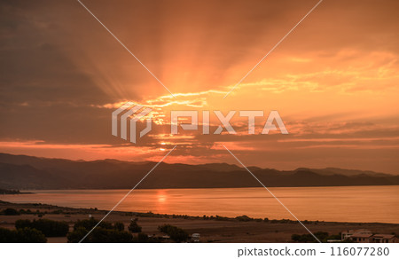 beautiful sunset against the backdrop of the sea and mountains on the island of Cyprus3 beautiful sunset against the backdrop of the sea and mountains on the island of Cyprus3 116077280