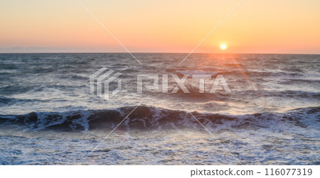 Beautiful view of the orange sunset over the island of Cyprus in the Mediterranean Sea. 1 Beautiful view of the orange sunset over the island of Cyprus in the Mediterranean Sea. 1 116077319