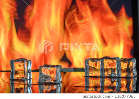 photo of a hot and cold drink with a steam and a ice cube 116077365