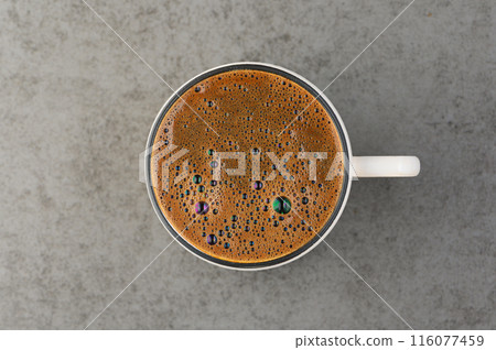 coffee in a cup on a stone kitchen counter top view coffee in a cup on a stone kitchen counter top view 116077459