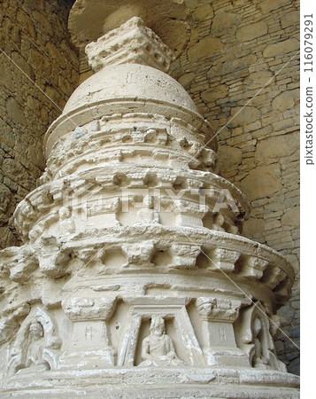 A votive stupa inside a small chapel at the remains of Mohra Mohradu Monastery in the ruins of the ancient city of Taxila in northern Pakistan (2007) 116079291