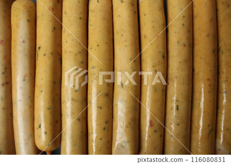 sausages in a package on a gray background. Background of food close-up. Vegans Vegetarian Food 116080831