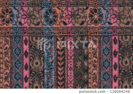 Nepalese textile background. Woven ethnic fabric texture Nepalese textile background. Woven ethnic fabric texture 116084248