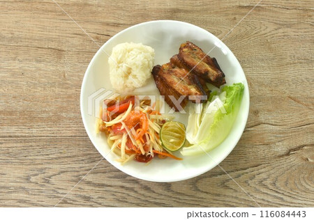 grilled saba fish or mackerel on rice topping sweet egg and crab stick couple pickled cabbage in plate dipping black sweet soybean sauce grilled saba fish or mackerel on rice topping sweet egg and crab stick couple pickled cabbage in plate dipping black sweet soybean sauce 116084443