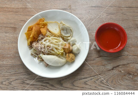 dry boiled meatball made from fish and shrimp with dumpling couple bean sprout on plate dipping spicy and sour sauce dry boiled meatball made from fish and shrimp with dumpling couple bean sprout on plate dipping spicy and sour sauce 116084444