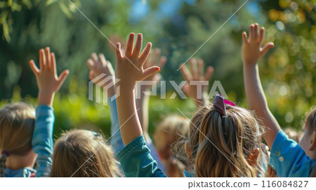 Children raising their hands 116084827