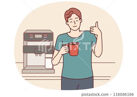 Man drinks coffee from mug standing near machine for making delicious espresso and shows thumbs up 116086166