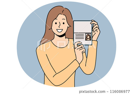 Woman demonstrates passport, rejoicing at receiving first id document or new citizenship Woman demonstrates passport, rejoicing at receiving first id document or new citizenship 116086977