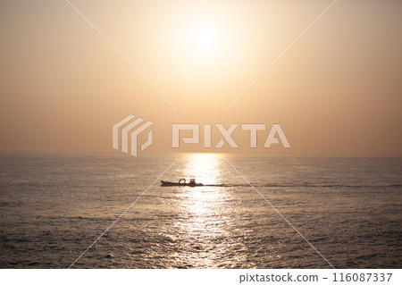 Sunset and fishing boat on the sea Sunset and fishing boat on the sea 116087337