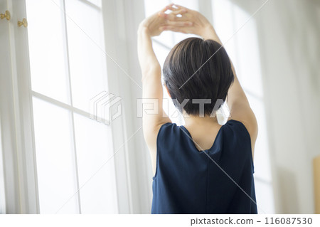 Middle-aged woman doing body care 116087530