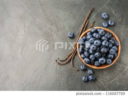 Blueberries on concrete backgrounds top view  116087789