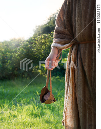 Man's hand with an old sling Man's hand with an old sling 116088173