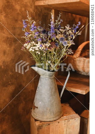 bouquet of dried flowers in a vintage vase bouquet of dried flowers in a vintage vase 116088421